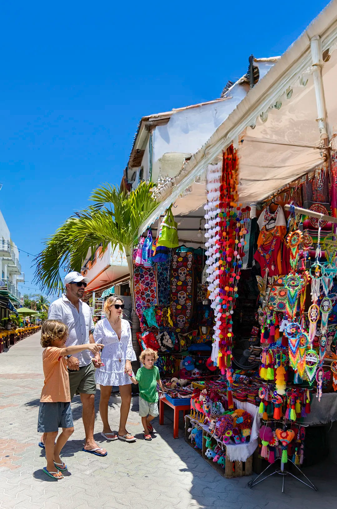 Family enjoying a Isla Mujeres tour, one of the best Cancun family activities.
