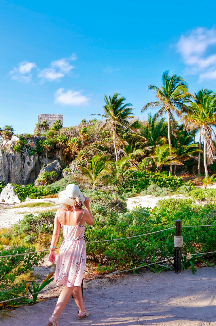 Woman on a Tulum Ruins walking tour.