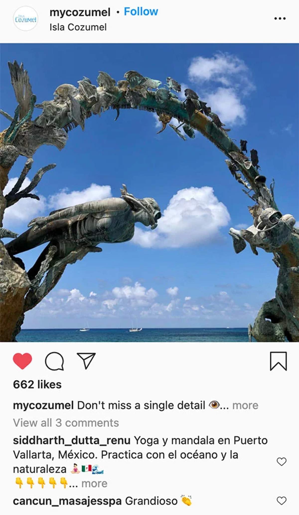 View of the Coral Reefs Monument in Cozumel, depicting marine life in a sculpted arch with the ocean and blue sky in the background.
