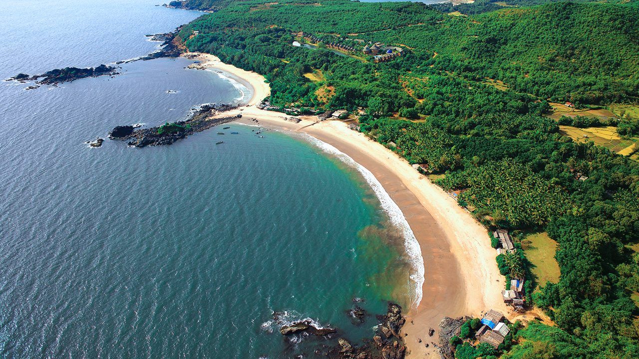 the om beach's majestic shape viewed from the top
