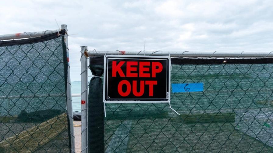 keep out beach sign