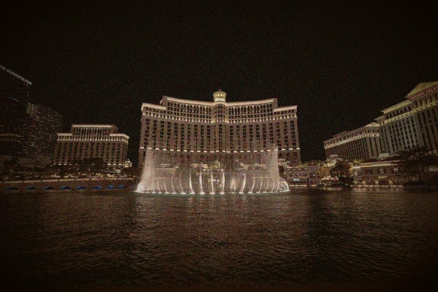 The illuminated Bellagio hotel and fountains in Las Vegas at night.
