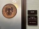 Entrance to the House Committee on Ways and Means office, room 1139, showing the committee seal on a glass door.