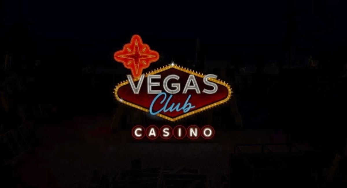 A glowing retro neon sign for "Vegas Club Casino" against a dark background.