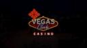A glowing retro neon sign for "Vegas Club Casino" against a dark background.