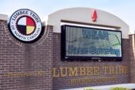 The Lumbee Tribe of North Carolina Housing Complex sign in Pembroke, NC, featuring the tribal