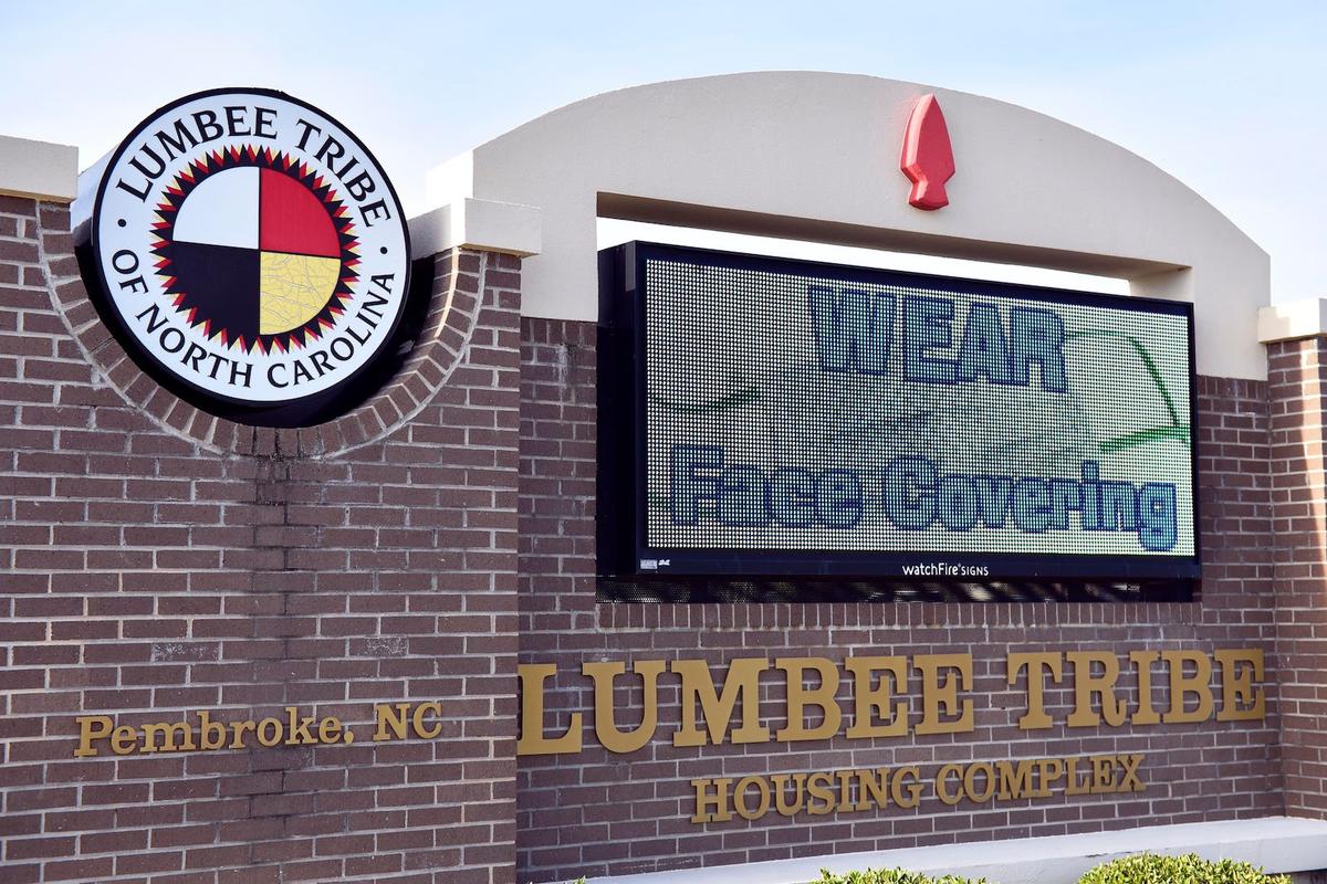 The Lumbee Tribe of North Carolina Housing Complex sign in Pembroke, NC, featuring the tribal