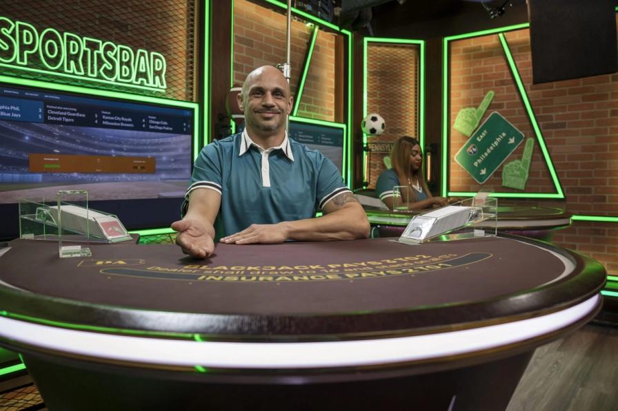 Shortly before the opening of the live sports area, dealers donned their uniforms and posed for photos (Courtesy Playtech)