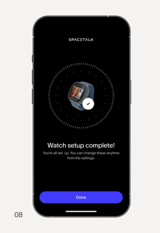 A smartphone displays the SPACETALK app's "Watch setup complete!" screen with an image of a smartwatch, a checkmark, and a "Done" button.