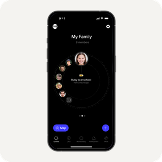 A smartphone displaying a dark-mode family safety app with a central profile of "Ruby at school" surrounded by other family members.