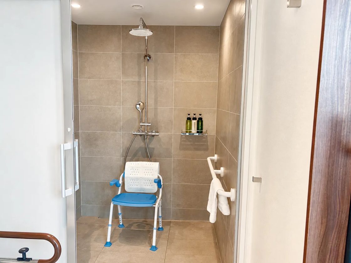 Shower chair and non-slip mat available for loan