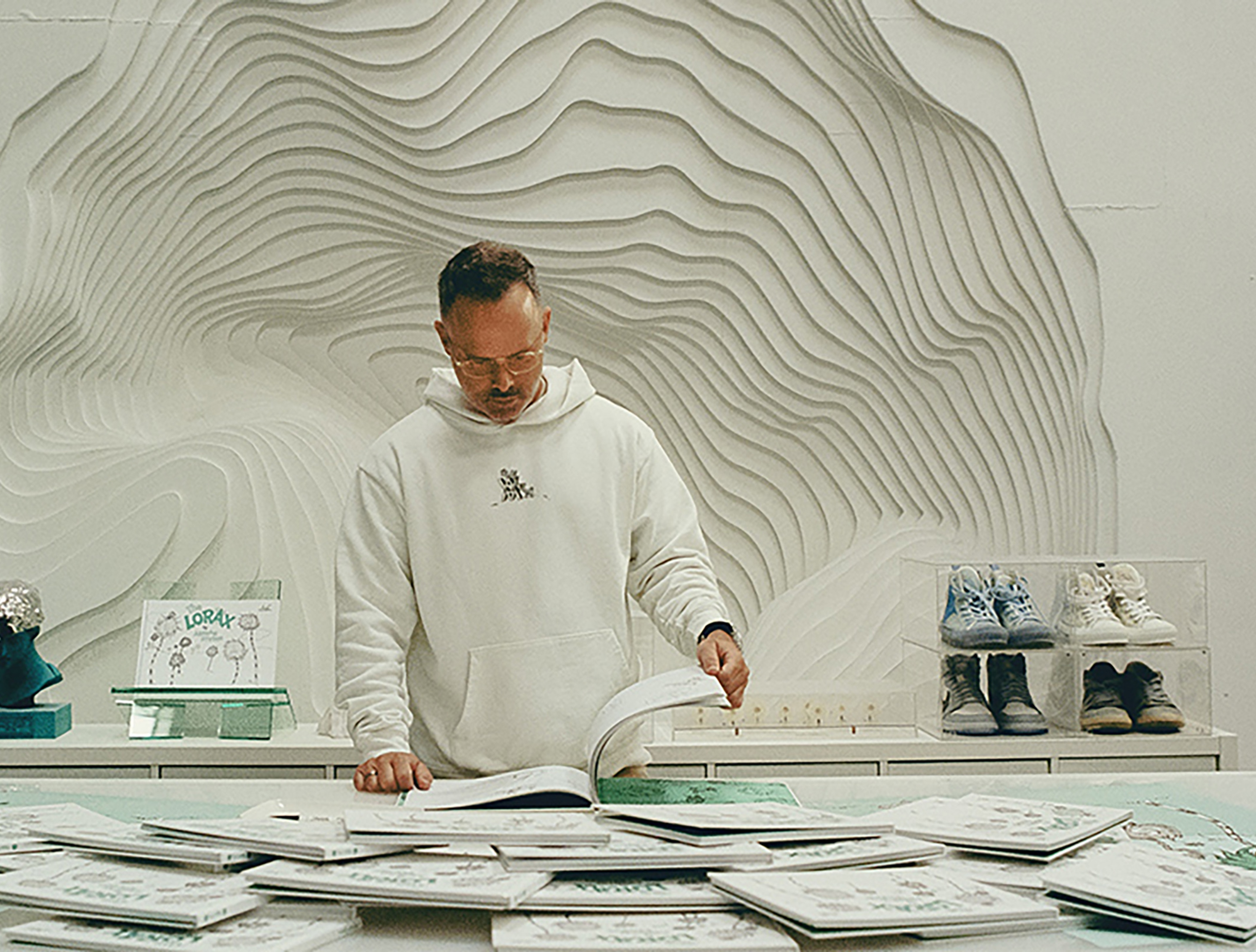 Daniel Arsham reading a book