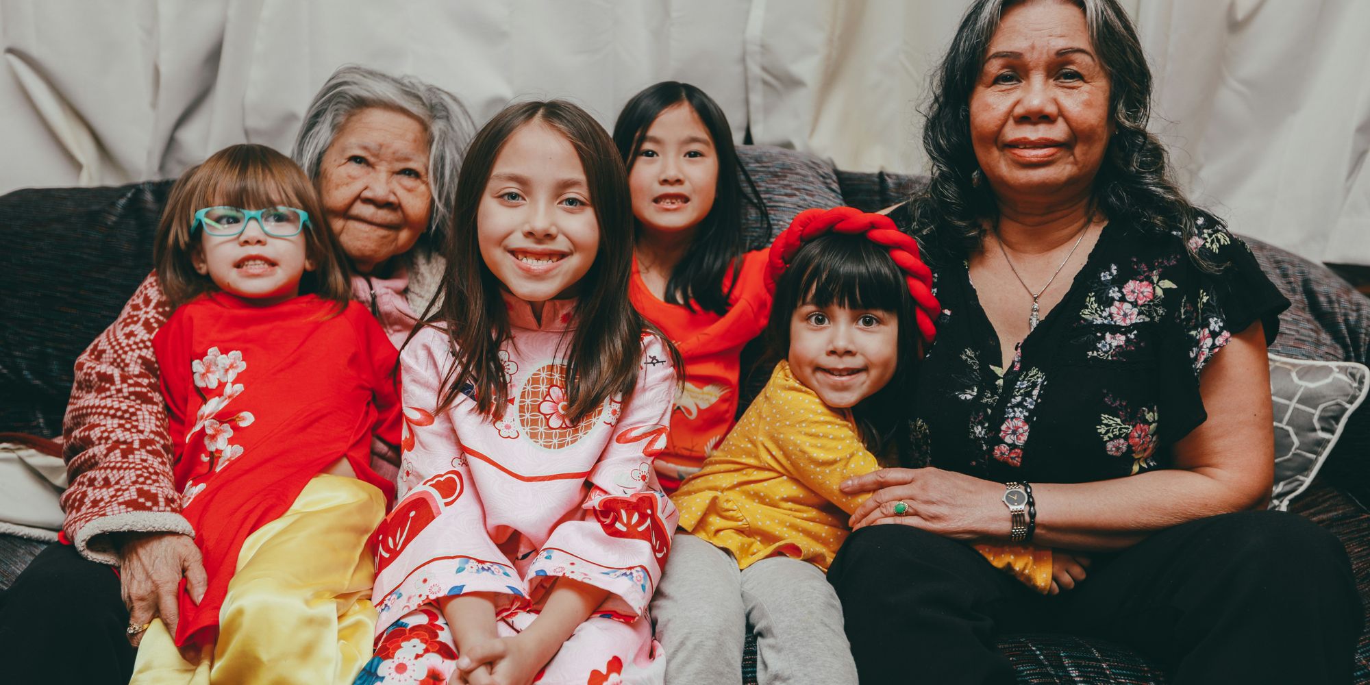 Family members of different generations sitting together