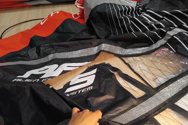 Image mise en avant - Réparation d'ailes de wingfoil : déchirures, boudins et valves - Guide expert