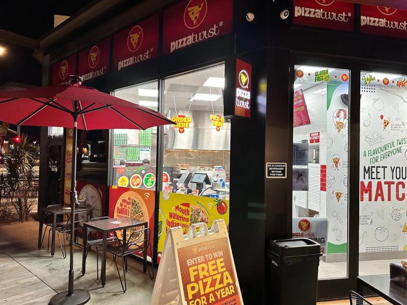 Pizza Twist storefront channel letters installed by VE Signs