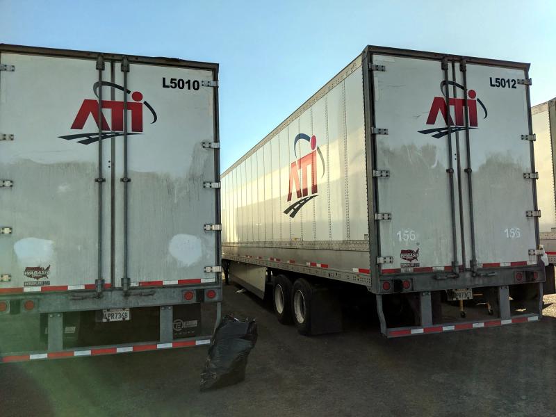 Rear logo graphics on a pair of ATI dry van trailers