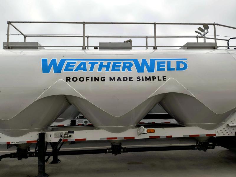WeatherWeld 'Roofing Made Simple' lettering across a pneumatic tanker trailer