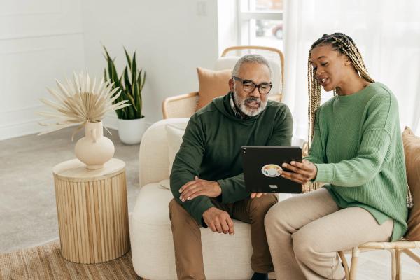 Woman explaining how easy estate planning can be to her relative