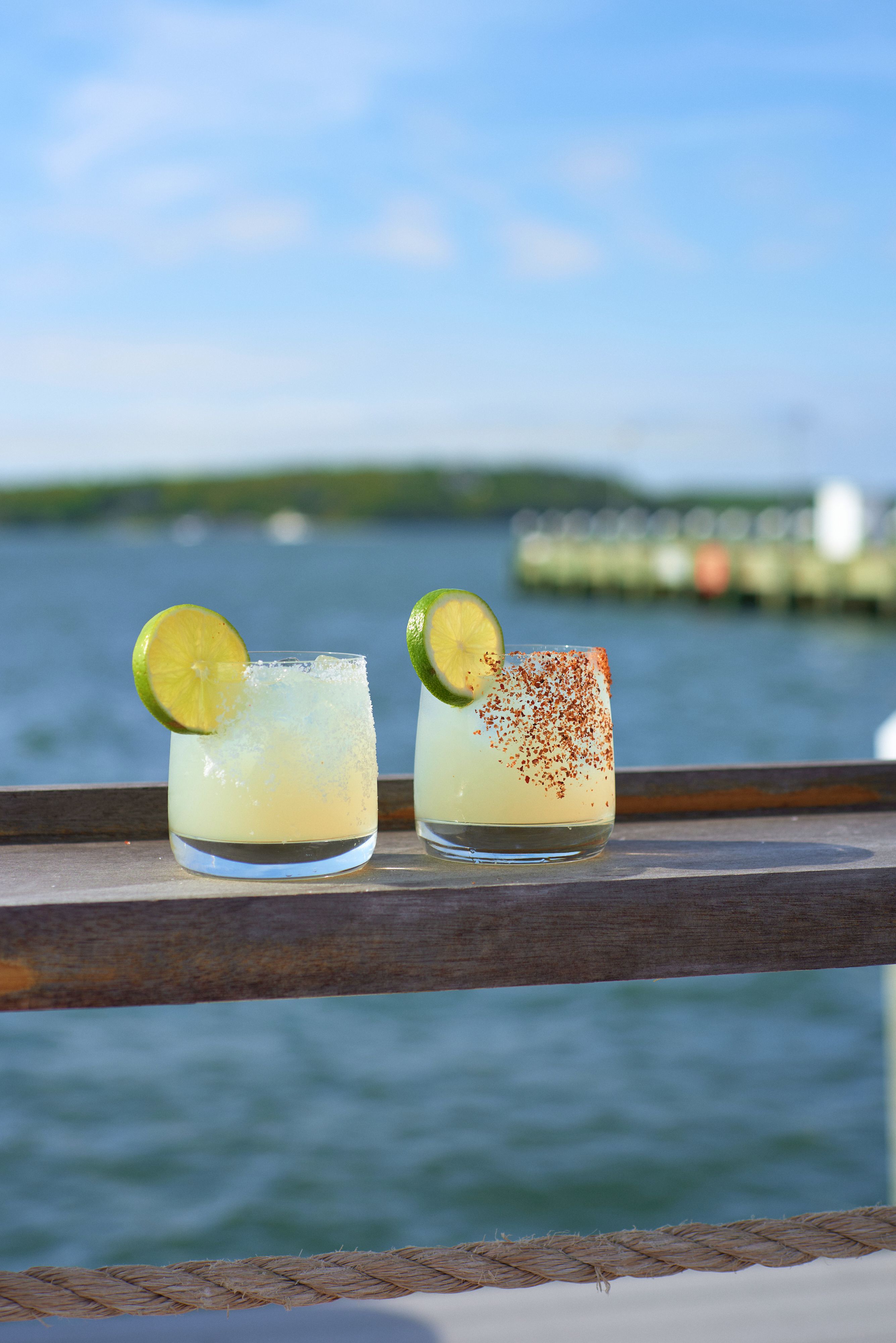 Spicy margaritas lined up on the dock rail