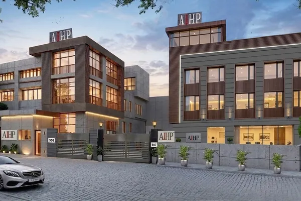 AIHP 507-508 building facade at dusk, Udyog Vihar Phase III, Gurgaon