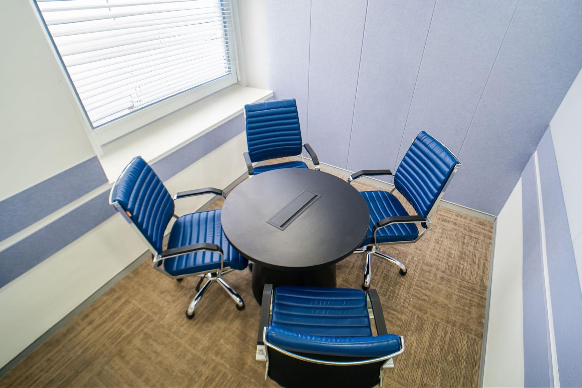 Small glass-walled meeting room at AIHP 507-508, Udyog Vihar Phase III