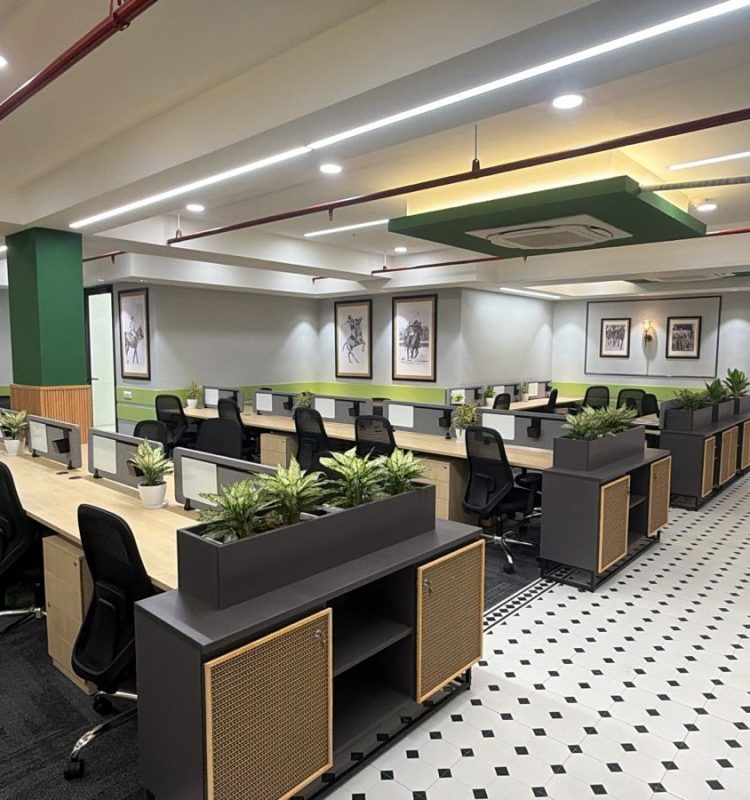 Open-plan managed workspace with rows of workstations at AIHP Cyber Greens 2