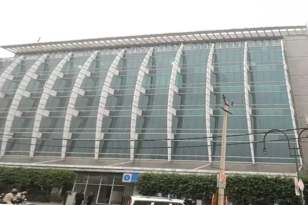 Veritas Tower on Golf Course Road, Gurgaon — glass-facade commercial building
