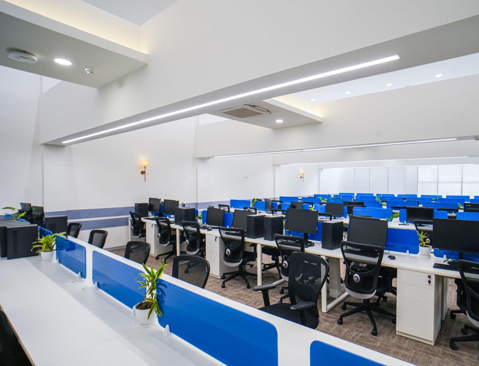Open-plan furnished workstations on a client floor at AIHP 507-508, Udyog Vihar