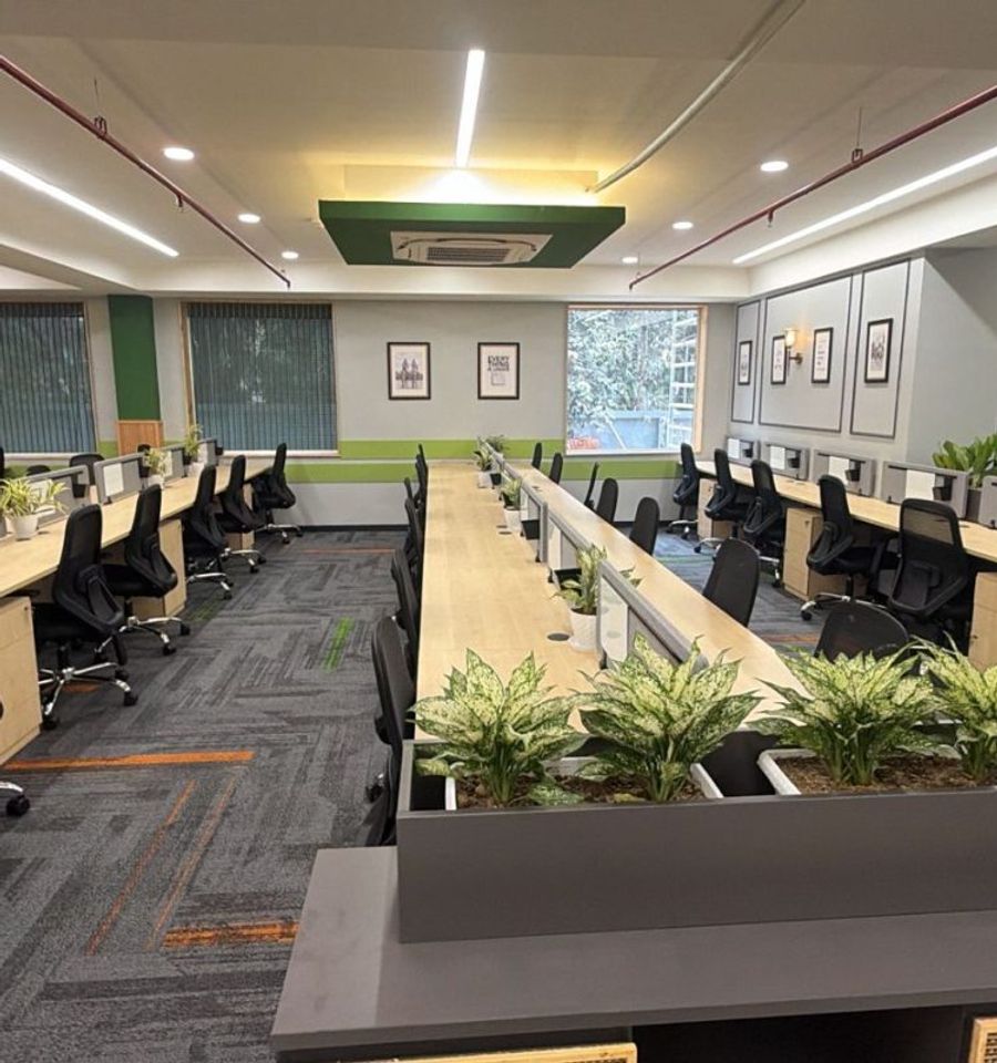 Managed private office floor with desks and warm lighting at AIHP Cyber Greens 2