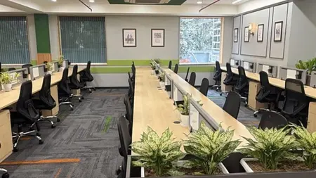 Managed private office floor with desks and warm lighting at AIHP Cyber Greens 2