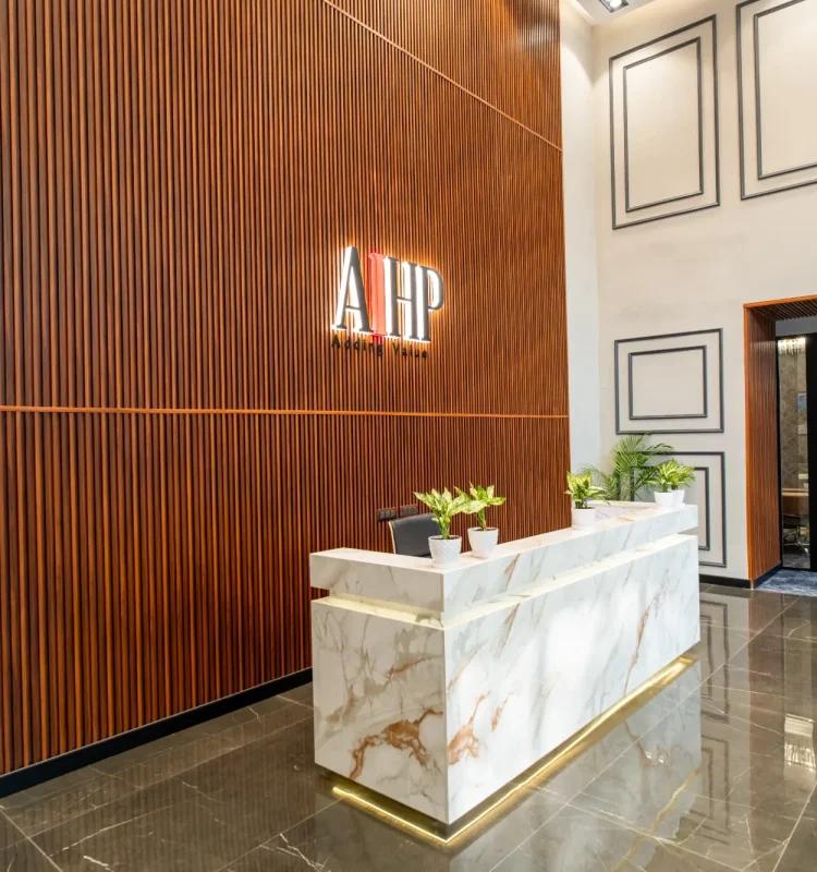 Lobby reception with backlit AIHP signage, Udyog Vihar Gurgaon