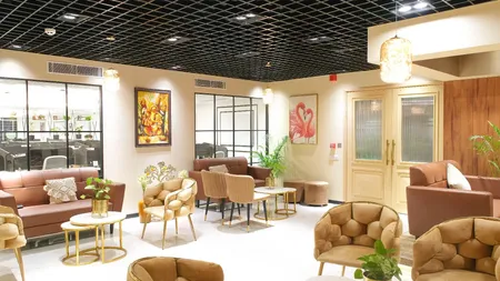 Premium lounge and breakout area at AIHP Tower, Udyog Vihar Gurgaon