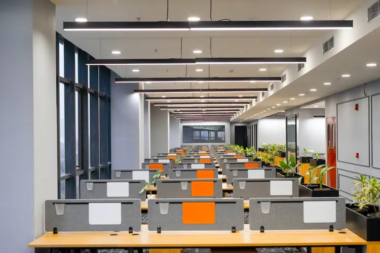 AIHP Skyline open-plan workstations under linear lighting, Sector 32 Gurgaon