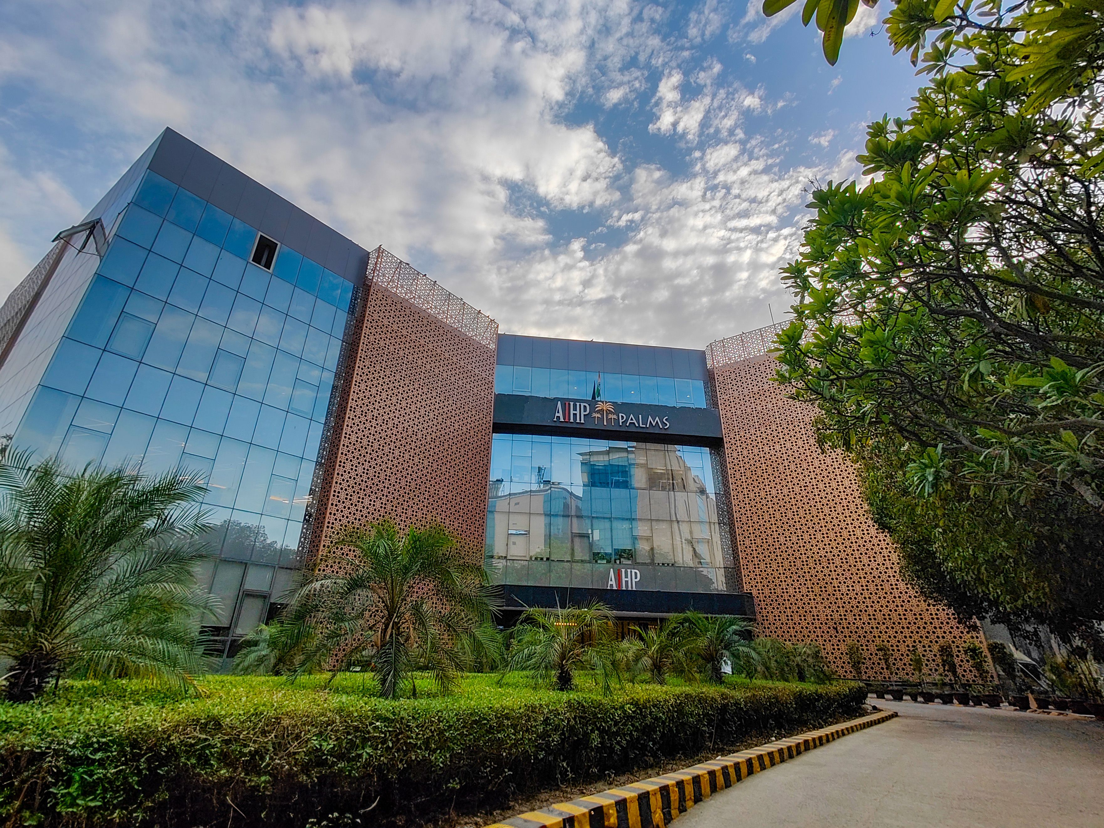 AIHP Palms — managed private office building in Udyog Vihar, Gurgaon
