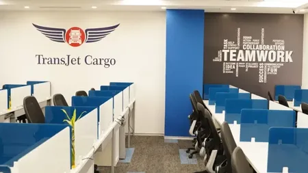 Reception area with a marble desk and AIHP logo signage on a wood-panelled wall at AIHP Cyber Greens