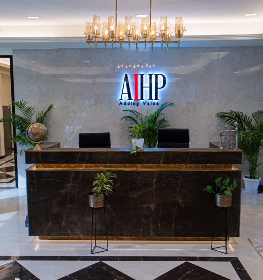 Grand double-height reception desk at AIHP Cyber Greens 2, Gurgaon