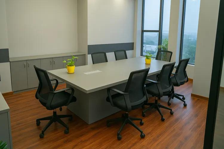 Conference room with city-view windows at an AIHP Sector 32 office, Gurgaon