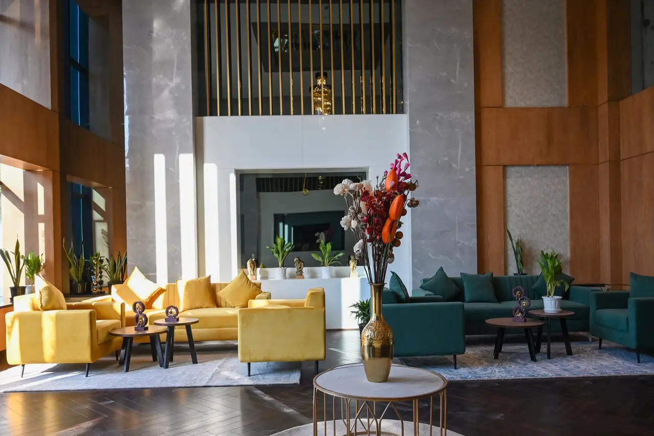 AIHP Skyline lobby lounge with seating and a chandelier, Sector 32, Gurgaon