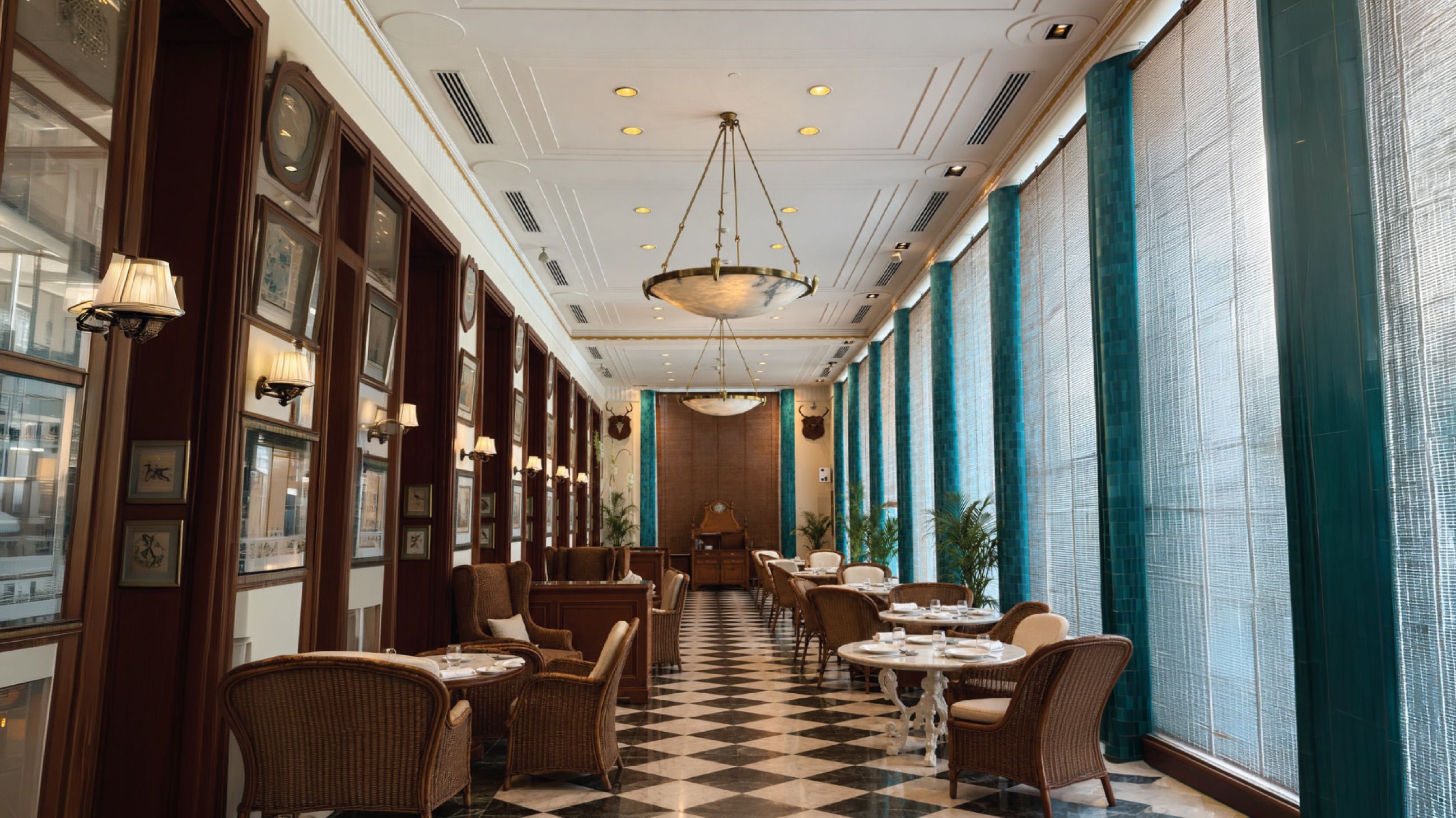The Dining Lounge — colonnaded indoor dining room at AIHP Imperial, Sector 32 Gurgaon