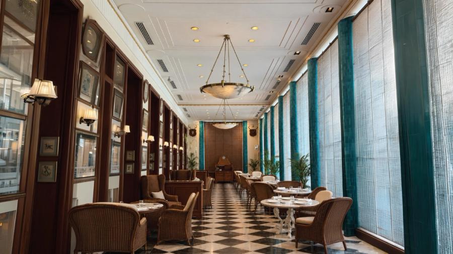 The Dining Lounge — colonnaded indoor dining room at AIHP Imperial, Sector 32 Gurgaon
