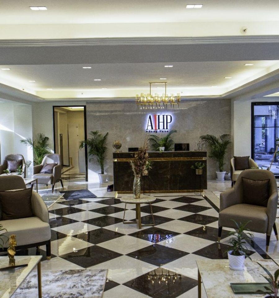 Reception lobby with checkered marble flooring at AIHP Cyber Greens 2