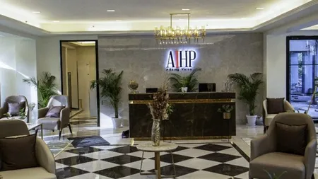 Reception lobby with checkered marble flooring at AIHP Cyber Greens 2