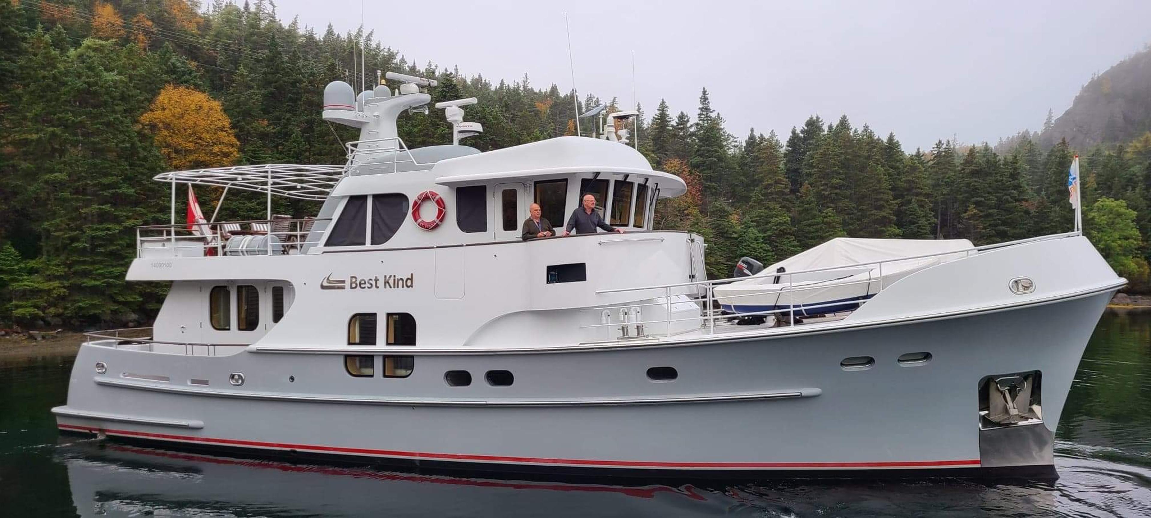 A large grey and white motoryacht