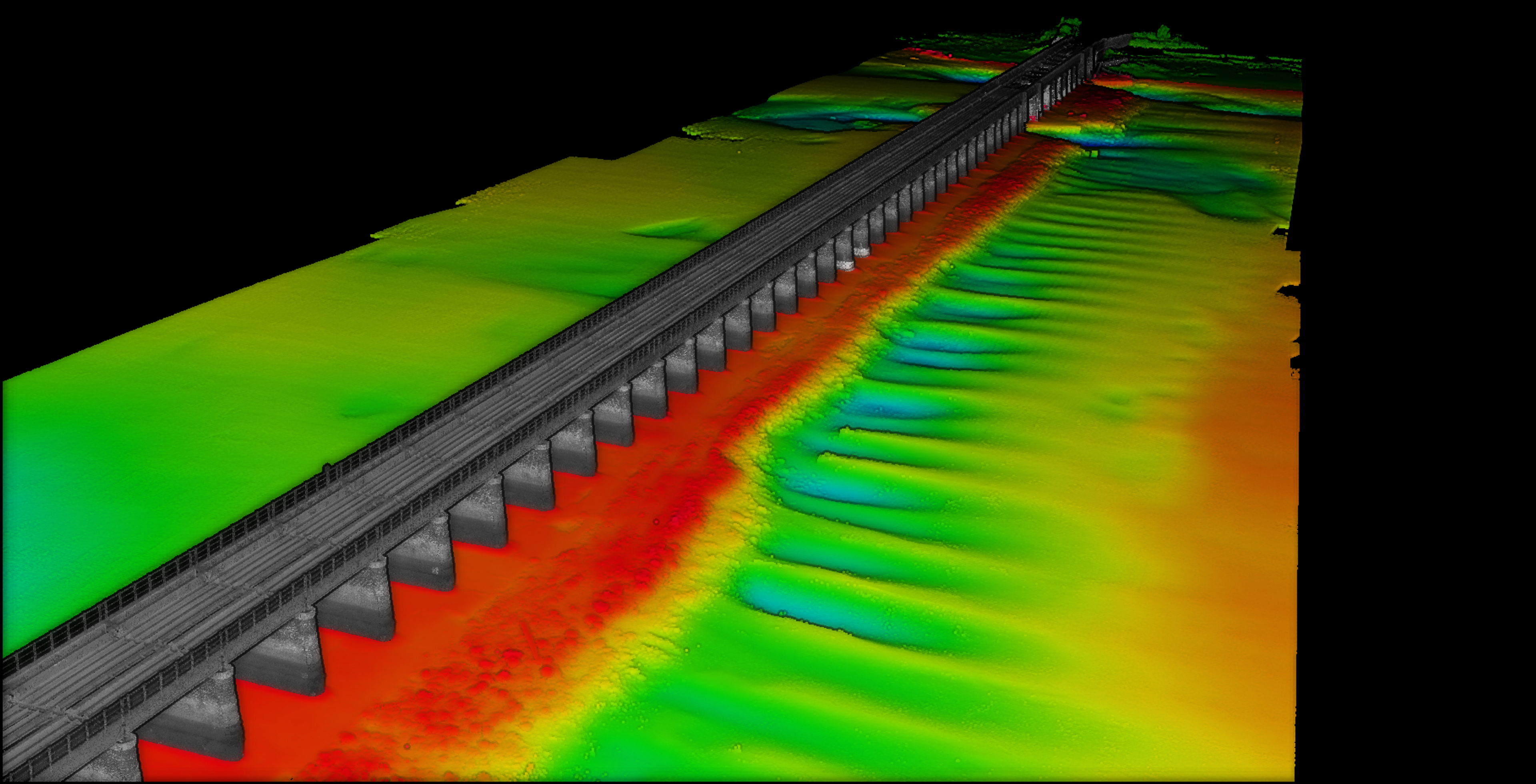 A multicoloured map showing the topography of a river bed around a bridge