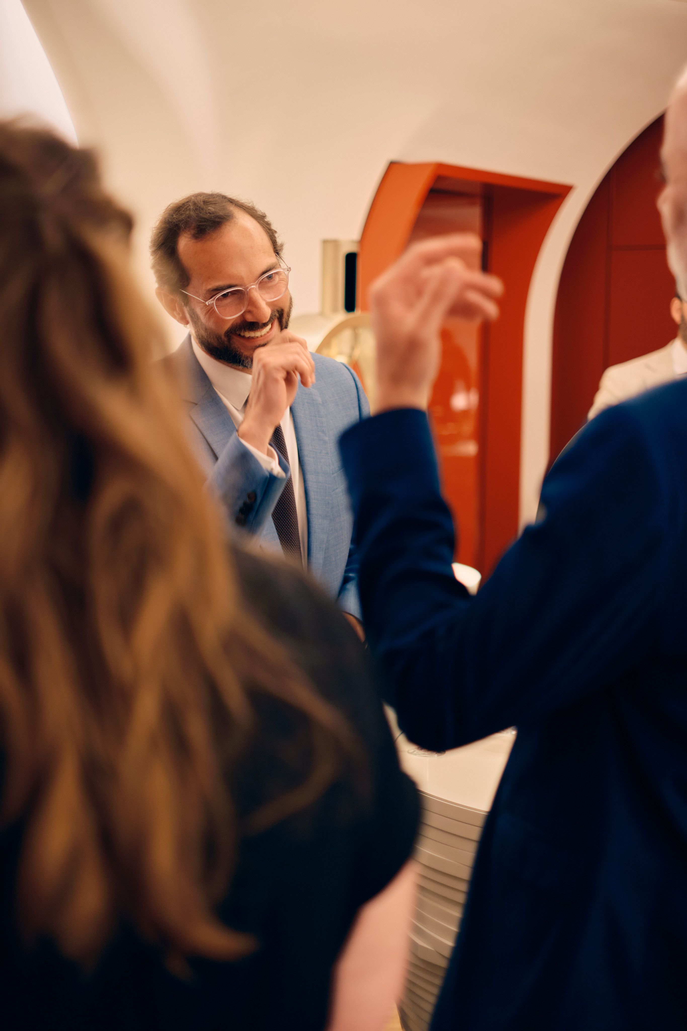 Guest making a champagne toast during a wedding reception speech