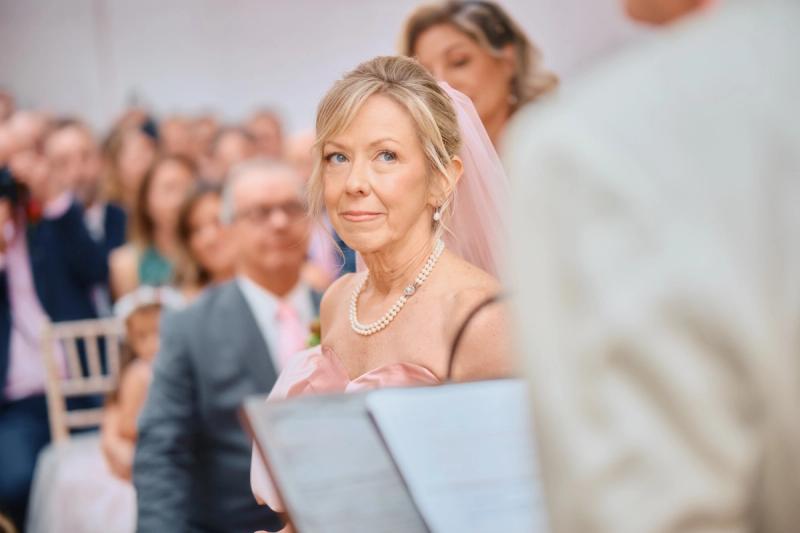 Guest reading a note during a wedding speech or toast