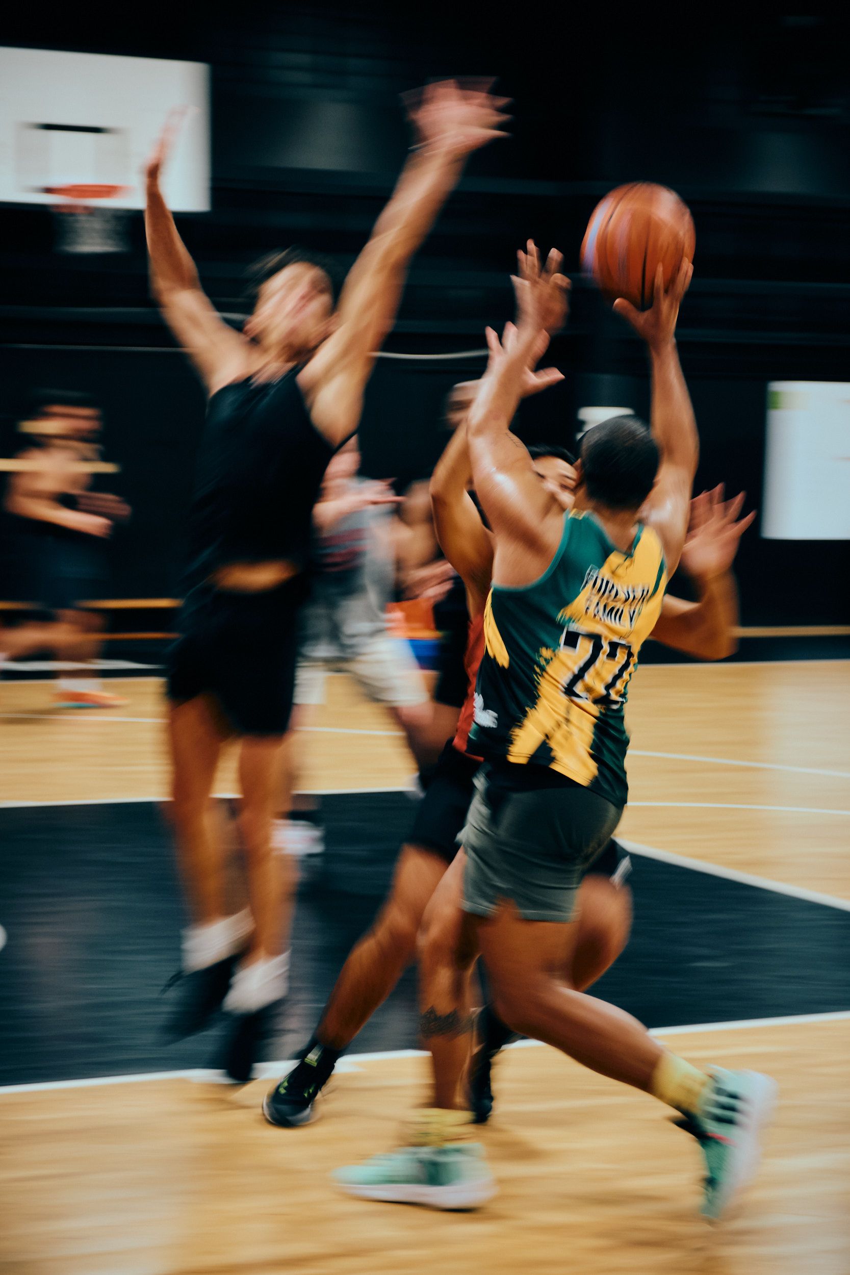 Professional sports photography showcasing athletic form and competitive intensity