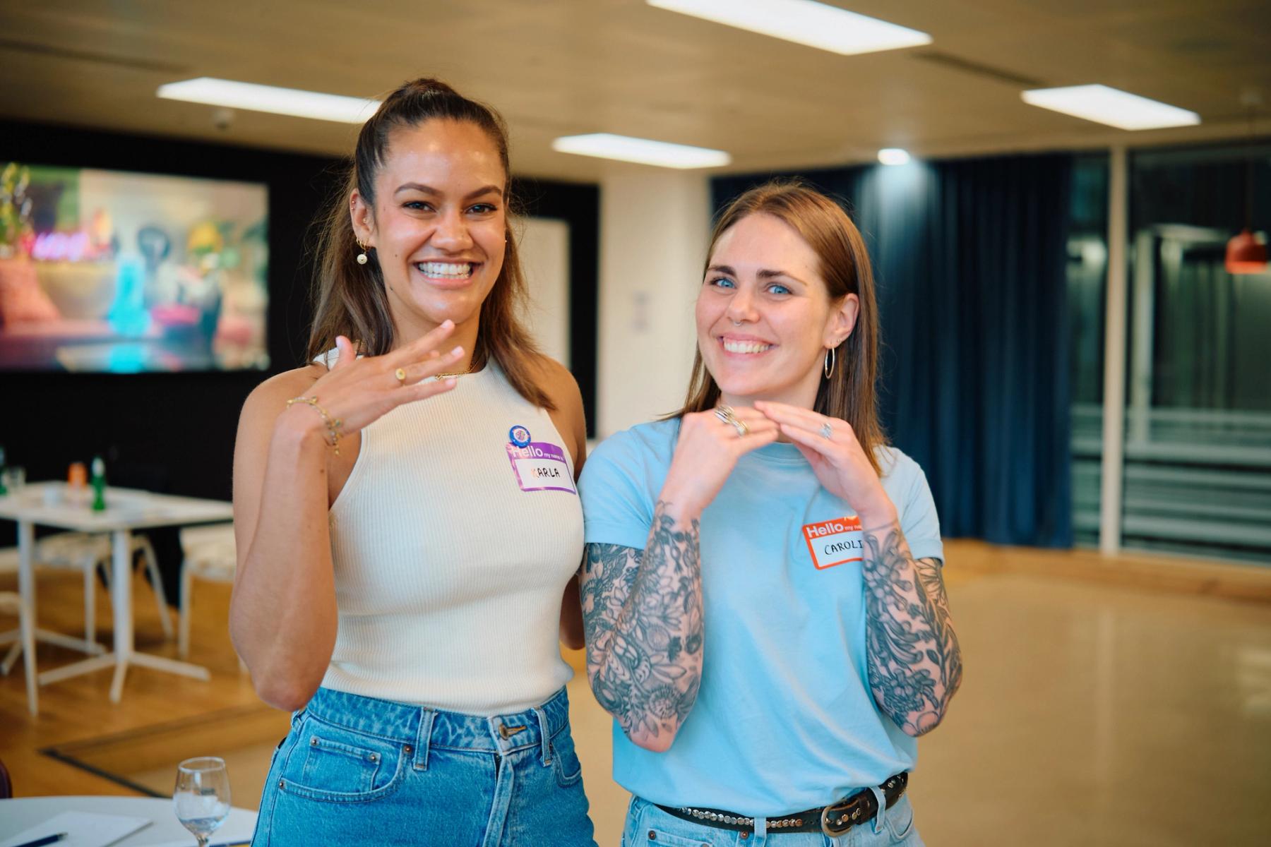 Access VFX community event 2026, Arla and Caroline smiling for the camera and showing their rings