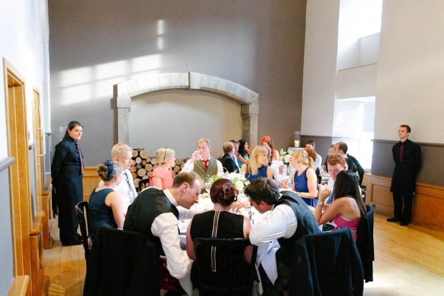 Wedding guests are having a dinner in the Queen Ann room of Edinburgh Castle