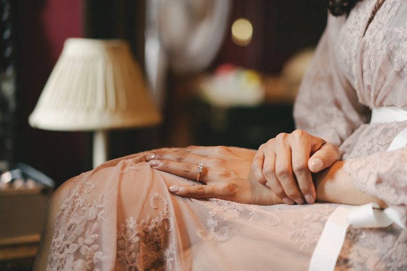 Bridal preparations - close-up shot of bride getting ready - planning the wedding